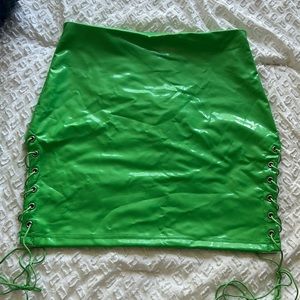 Leather like green skirt with slits on each side